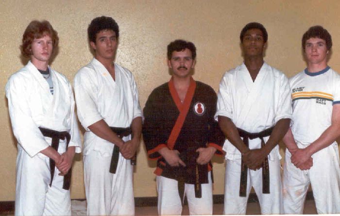My 2nd Master in Farang Arts, Grand Master James Gordon. At the time of this picture, our school had the North West Regional Lt Wt (Derik Whaley on my right), Middle Wt (myself) and Hvy Wt (Wayne Pratt on the left of Master Gordon) full contact champions. We certainly were a FIGHTING school.